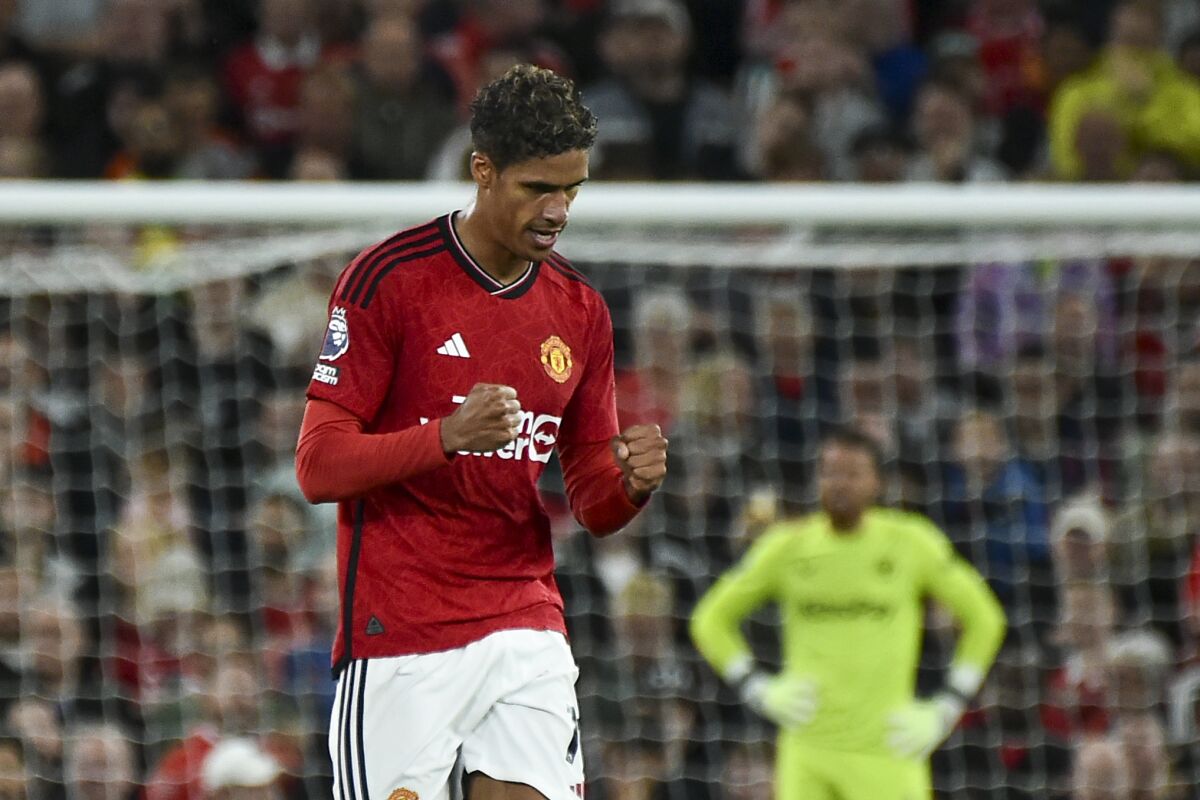 Man United needs late goal by Raphael Varane to beat dominant Wolves 1-0 in Premier League opener - The San Diego Union-Tribune
