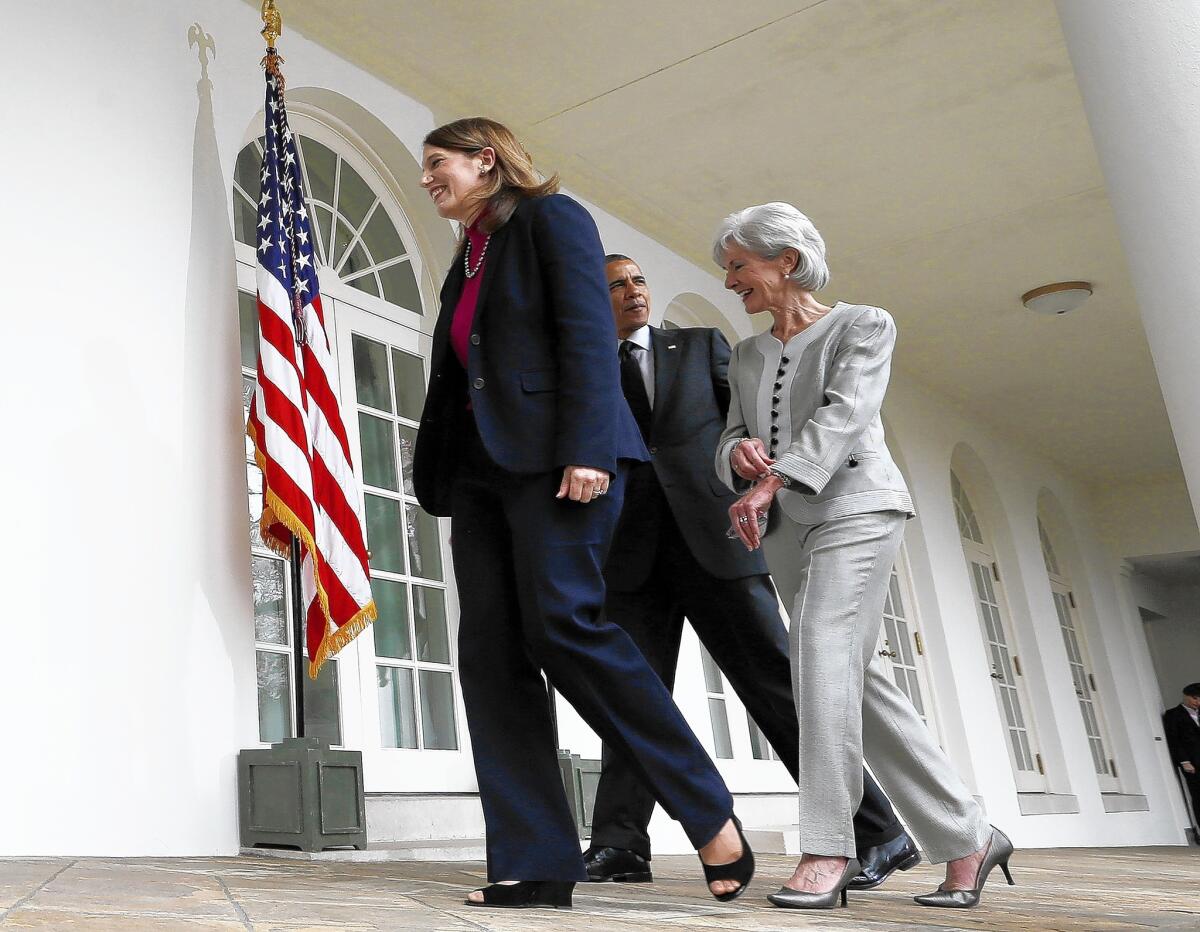 President Obama leaves the White House Rose Garden with outgoing Health and Human Services Secretary Kathleen Sebelius, right, and his nominee to replace her, budget director Sylvia Mathews Burwell.