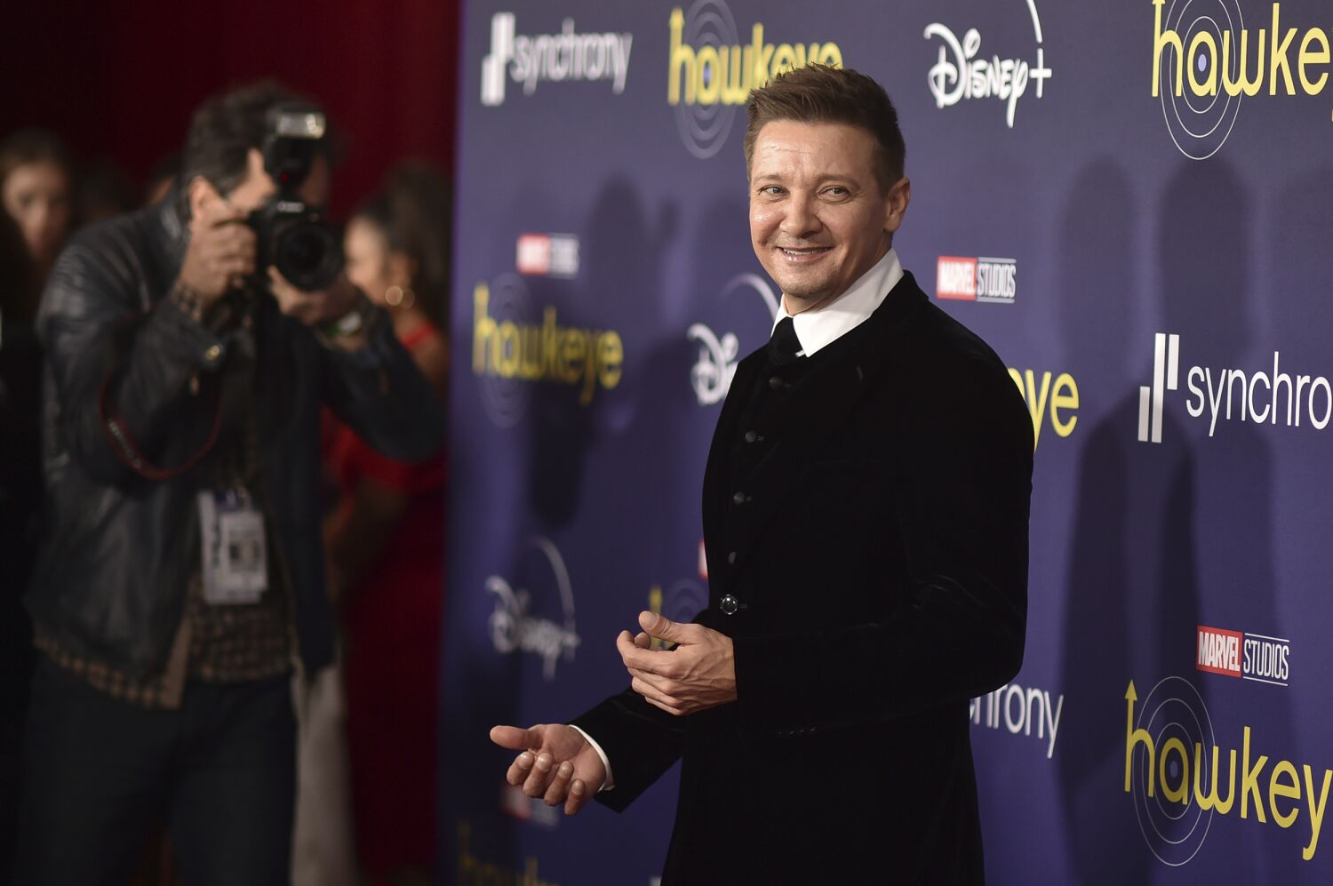 Jeremy Renner is out of the hospital and watching himself on TV at home with family
