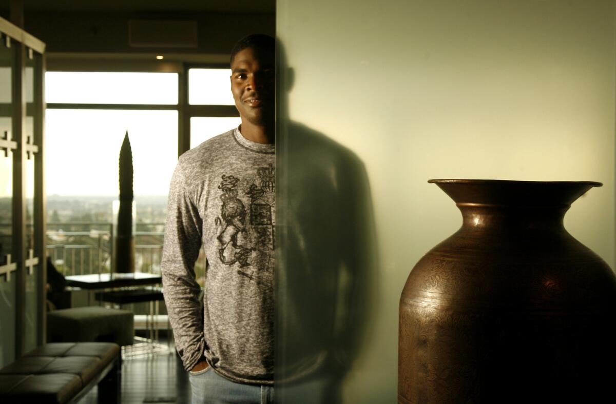 Keyshawn Johnson, a former Carolina Panthers wide receiver from USC, inside his home in Los Angeles.