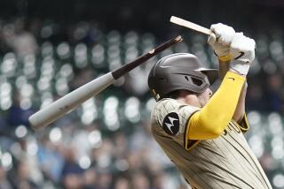 San Diego Padres' Jackson Merrill breaks his bat as he grounds out during the fifth inning of a baseball game against the Milwaukee Brewers Tuesday, April 16, 2024, in Milwaukee. (AP Photo/Morry Gash)