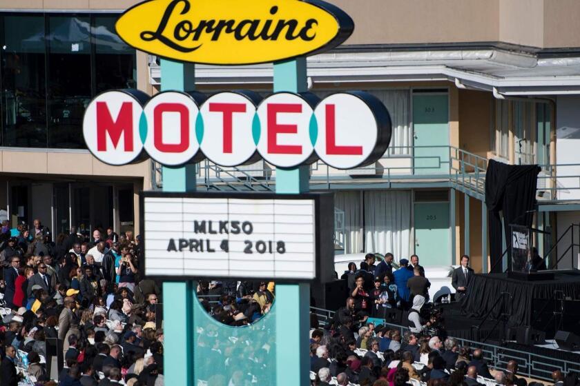 People listen to speakers during an event at the Lorraine Motel commemorating the 50th anniversary of the assassination of Martin Luther King Jr. April 4, 2018 in Memphis, Tennessee. / AFP PHOTO / Brendan SmialowskiBRENDAN SMIALOWSKI/AFP/Getty Images ** OUTS - ELSENT, FPG, CM - OUTS * NM, PH, VA if sourced by CT, LA or MoD **