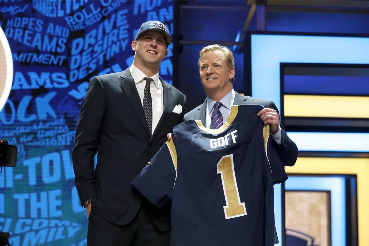 Jared Goff poses with NFL commissioner Roger Goodell after being picked first in the 2016 draft by the Rams.