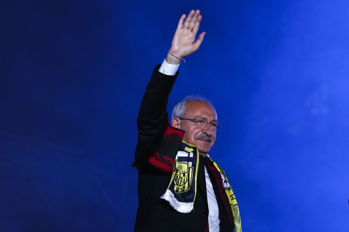 Turkey's CHP party leader and National Alliance presidential candidate Kemal Kılıçdaroğlu gestures to supporters.