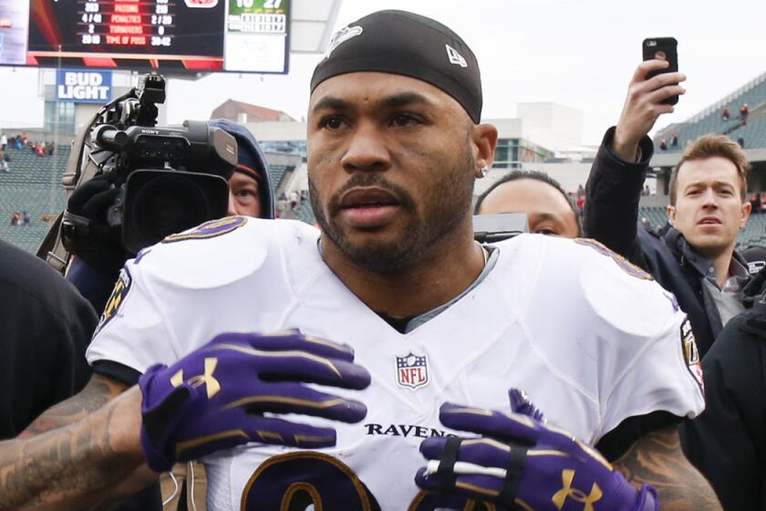 Baltimore receiver Steve Smith walks off the field after his final NFL game on Jan. 1 in Cincinnati.