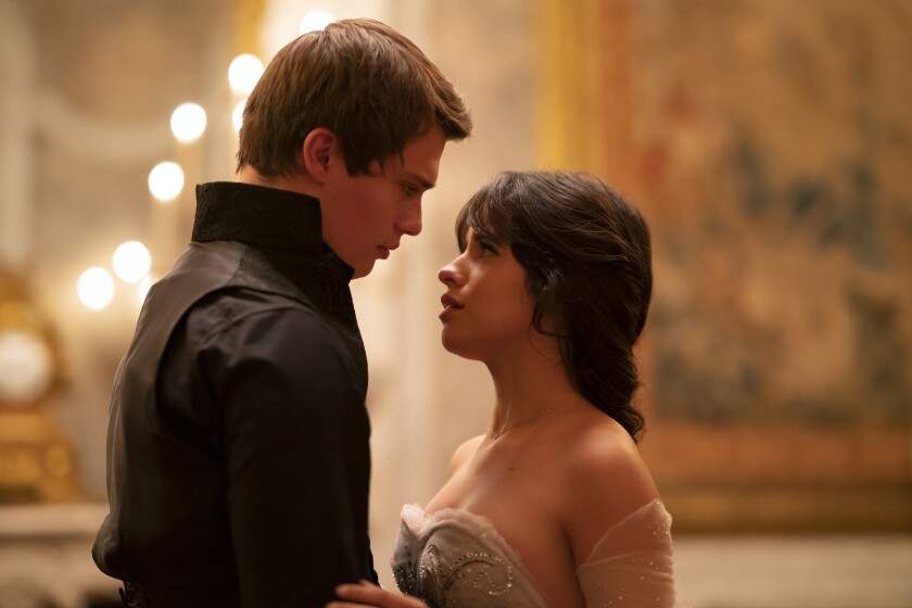 A prince and a young woman gaze expectantly into each other's eyes in the movie “Cinderella.”