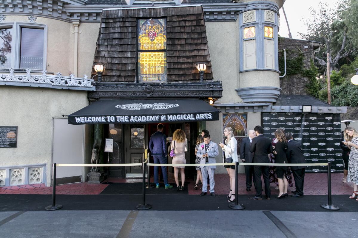Guests line up at the entrance to the Magic Castle in 2019.