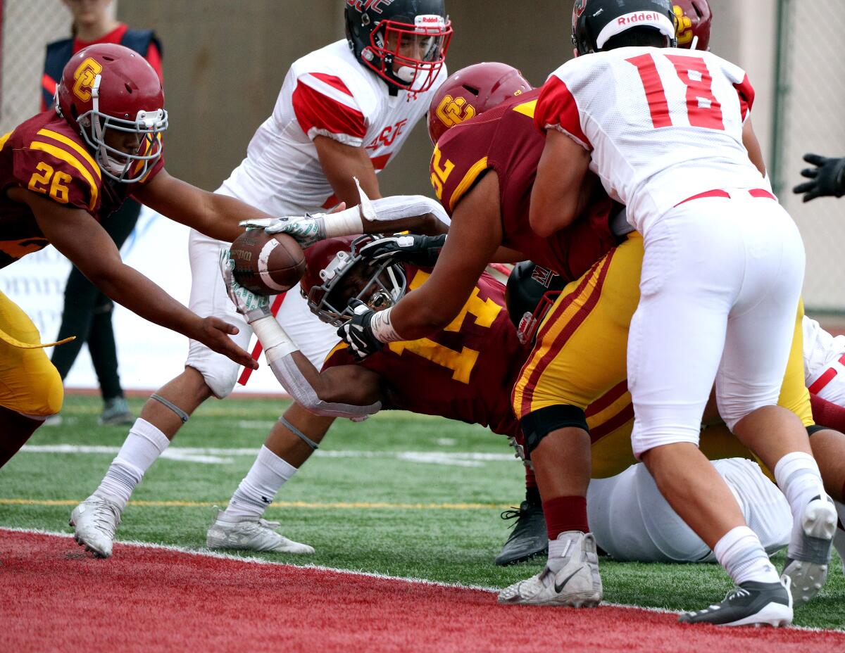 Glendale Community College RB Tre Fugate stretches to make a touchdown in home game vs. Mt. San Jacinto College, at Sartoris Field in Glendale on Saturday, Sept. 28, 2019.