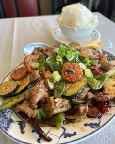 A chicken and vegetable dish at Peter Chu’s Skyroom.