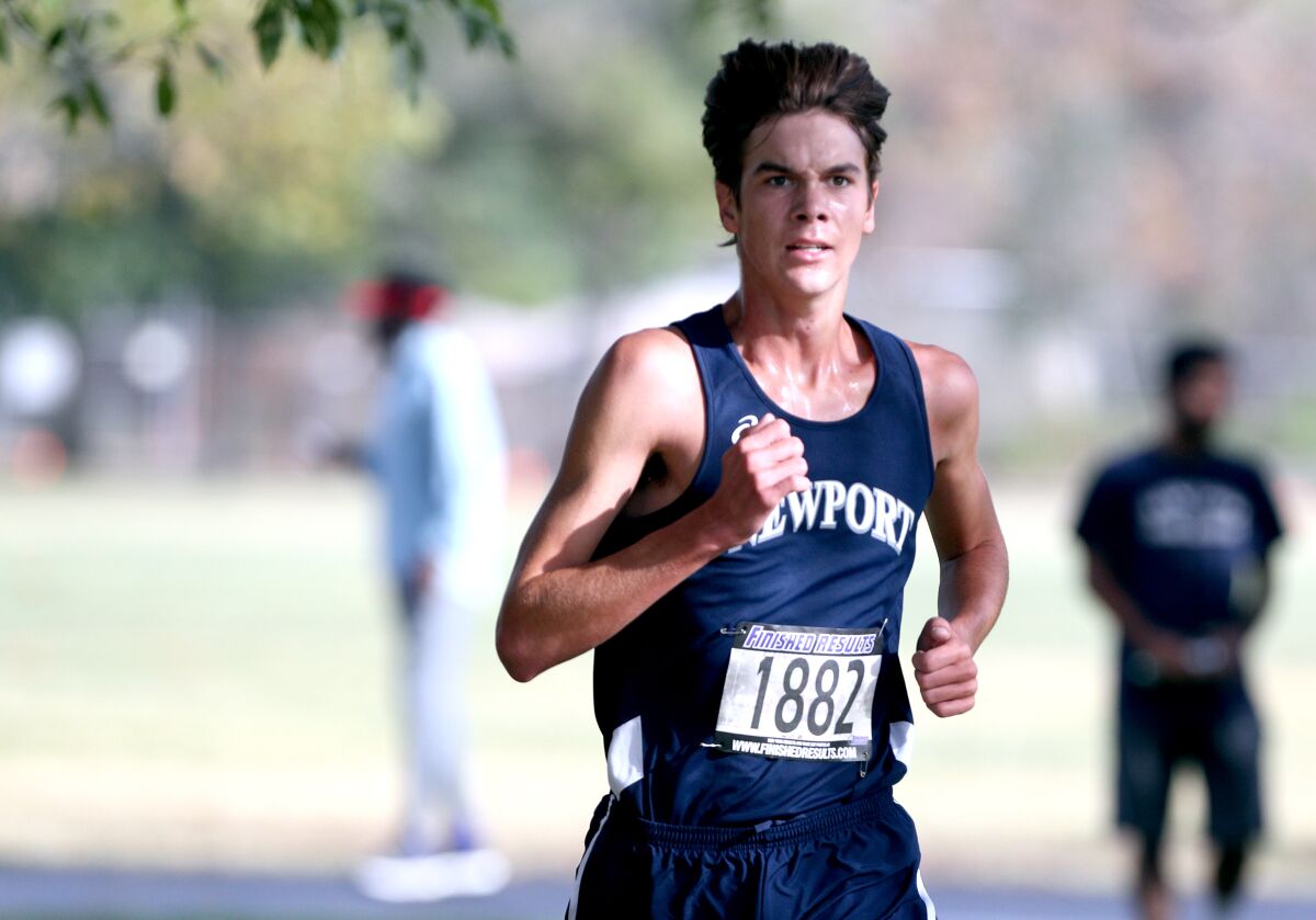 Newport Harbor's Will DeBassio runs in the Sunset Conference final at Central Park in Huntington Beach on Nov. 2.