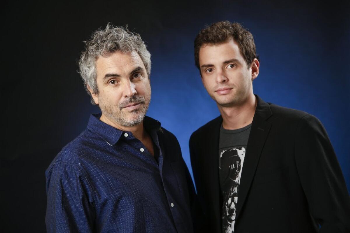 Father and son screenwriting duo Alfonso and Jonas Cuaron.