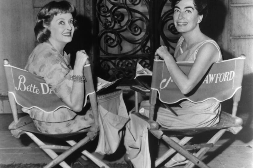 Bette Davis and Joan Crawford in between scenes from the film 'What Ever Happened To Baby Jane?', 1962. Credit: Warner Brothers / Getty Images