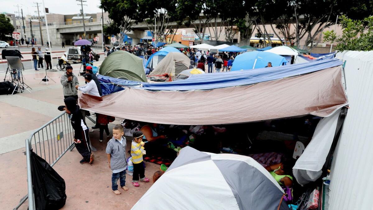 Close to 200 Central American migrants seeking asylum at an encampment near the Chaparral port of entry in Tijuana, Mexico.