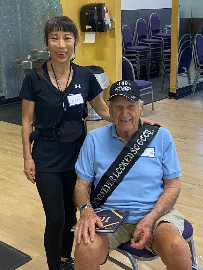 Irwin Wertheimer with 24 Hour Fitness Trainer Yuri Imaizumi at the 24 Hour Fitness La Terraza club.