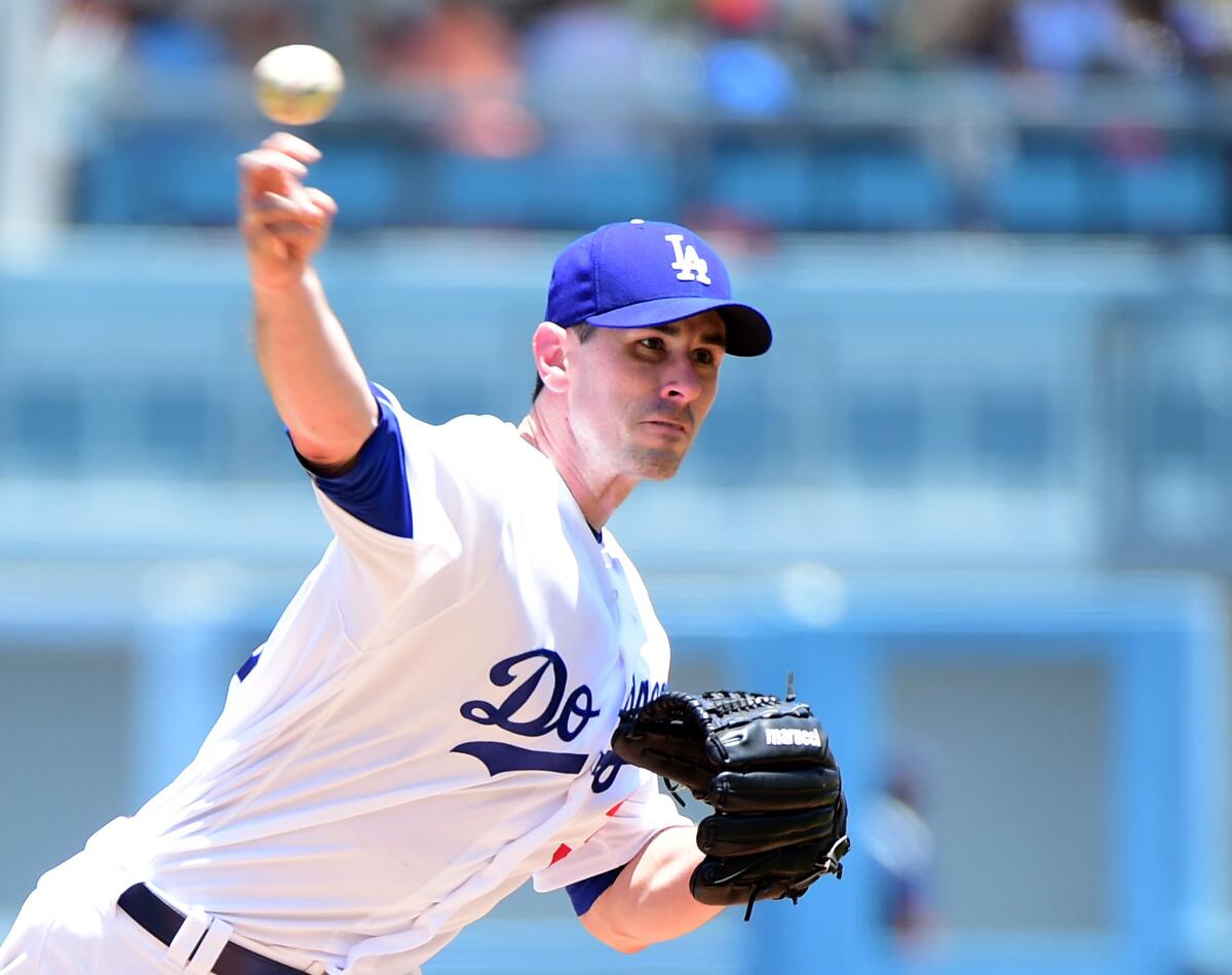 Brandon McCarthy delivers for the Dodgers in his first game in the major leagues in more than 14 months.