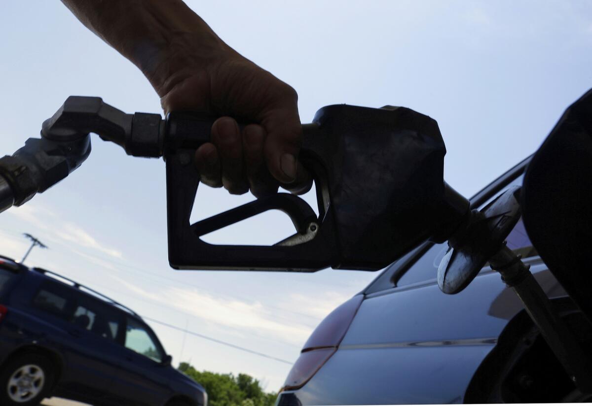 The price of crude oil retreated Thursday, easing fears that gas prices will rise this fall.