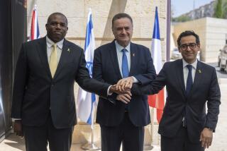 Britain's Foreign Secretary David Lammy, left, and French Foreign Minister Stéphane Séjourné, right, are welcomed by Israeli Minister of Foreign Affairs Israel Katz, at their meeting in Jerusalem, Friday, Aug. 16, 2024. (AP Photo/Ohad Zwigenberg)