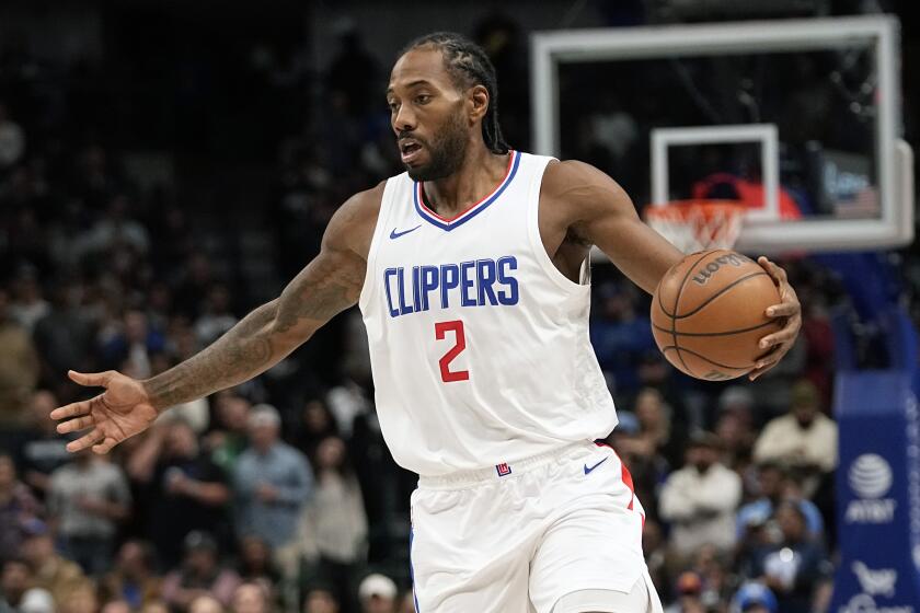 Los Angeles Clippers forward Kawhi Leonard (2) drives during the first half.