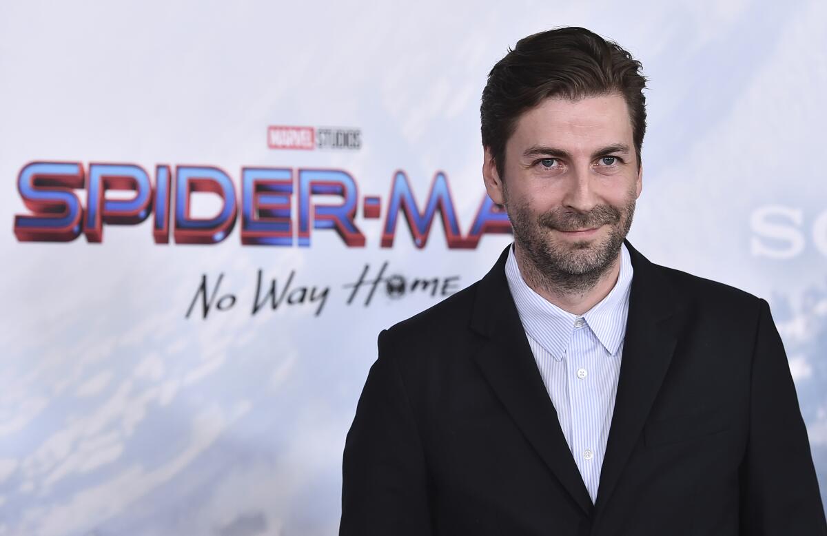 Jon Watts, diretor da trilogia Homem-Aranha no MCU, em um evento.
