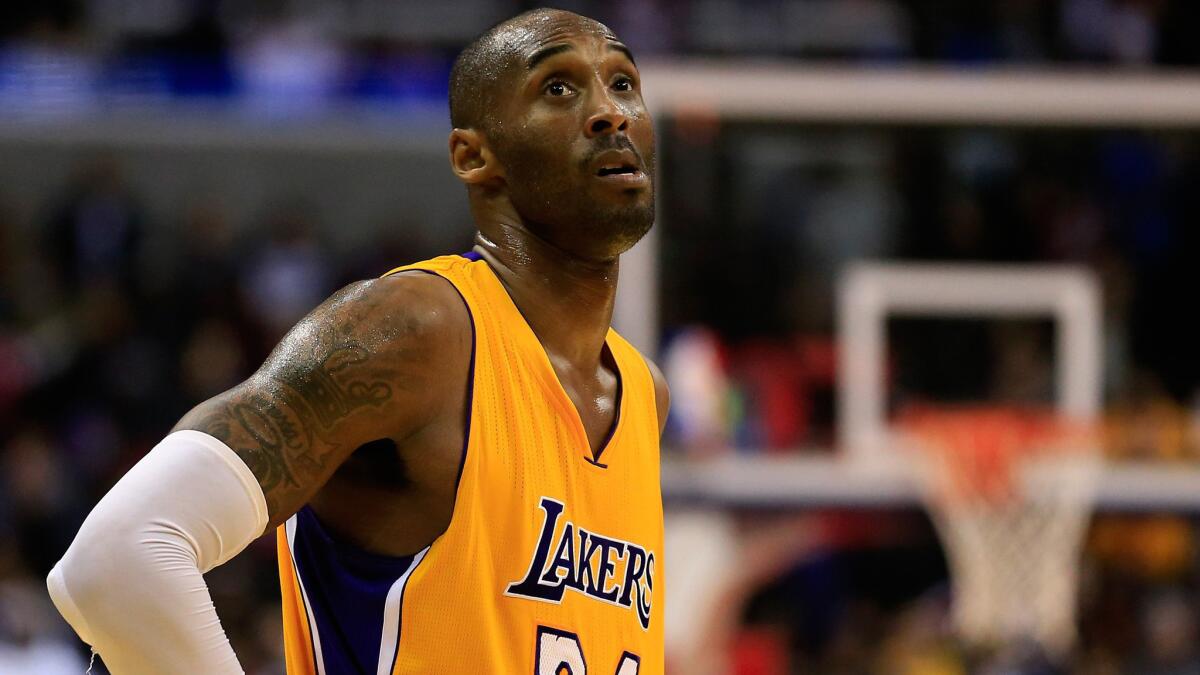 Lakers star Kobe Bryant looks on during the closing moments of a 111-95 loss to the Washington Wizards on Dec. 3. Don't expect to see many wins from the Lakers in 2015.