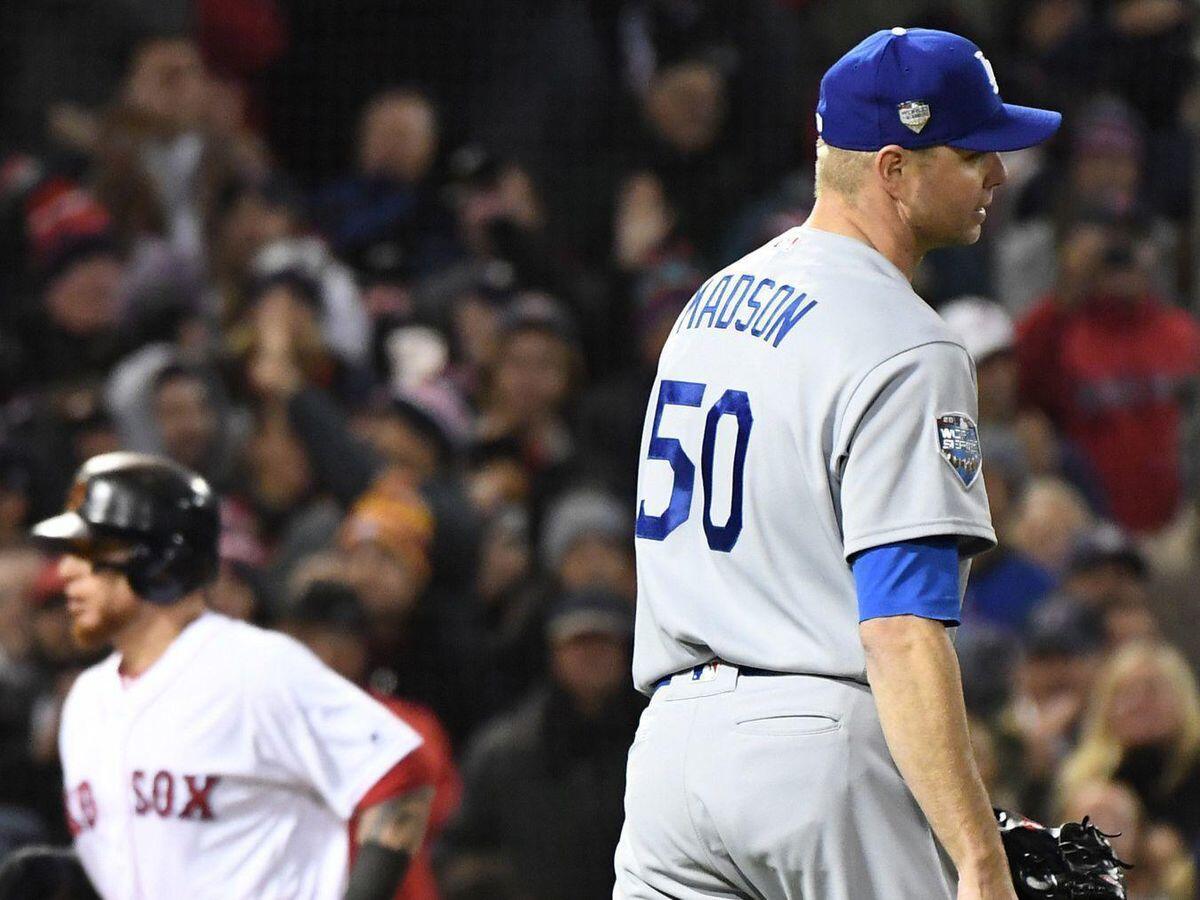 Dodger relief pitcher Ryan Madsen is disgusted after walking Steve Pearce of the Red Sox with the bases loaded.