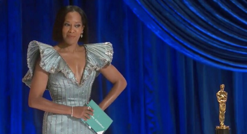 "One Night in Miami..." director Regina King opened the 2021 Oscars ceremony.