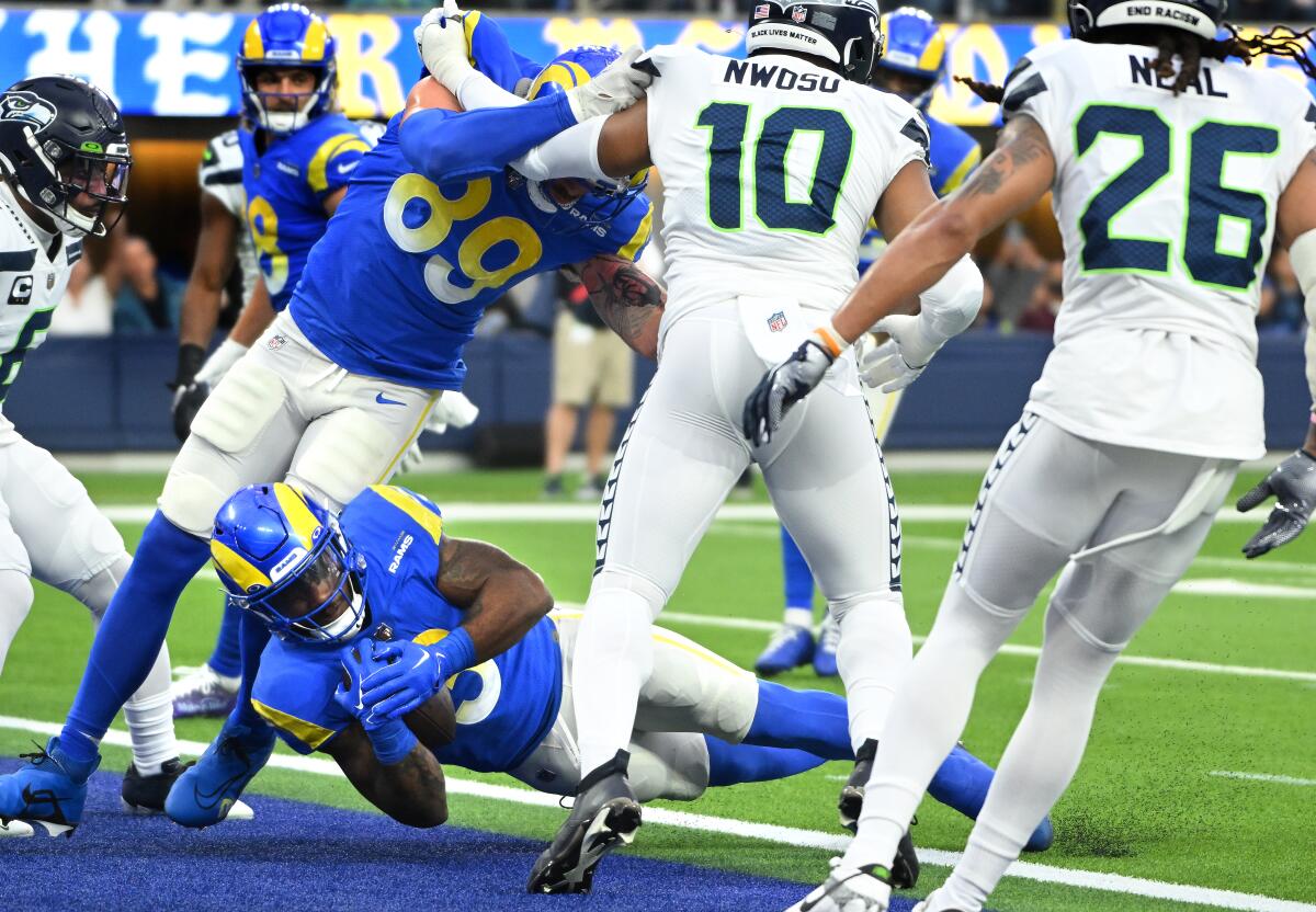 Rams running back Cam Akers scores touchdown against Seattle in the first quarter.