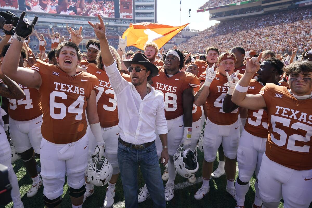 college football fans cheering