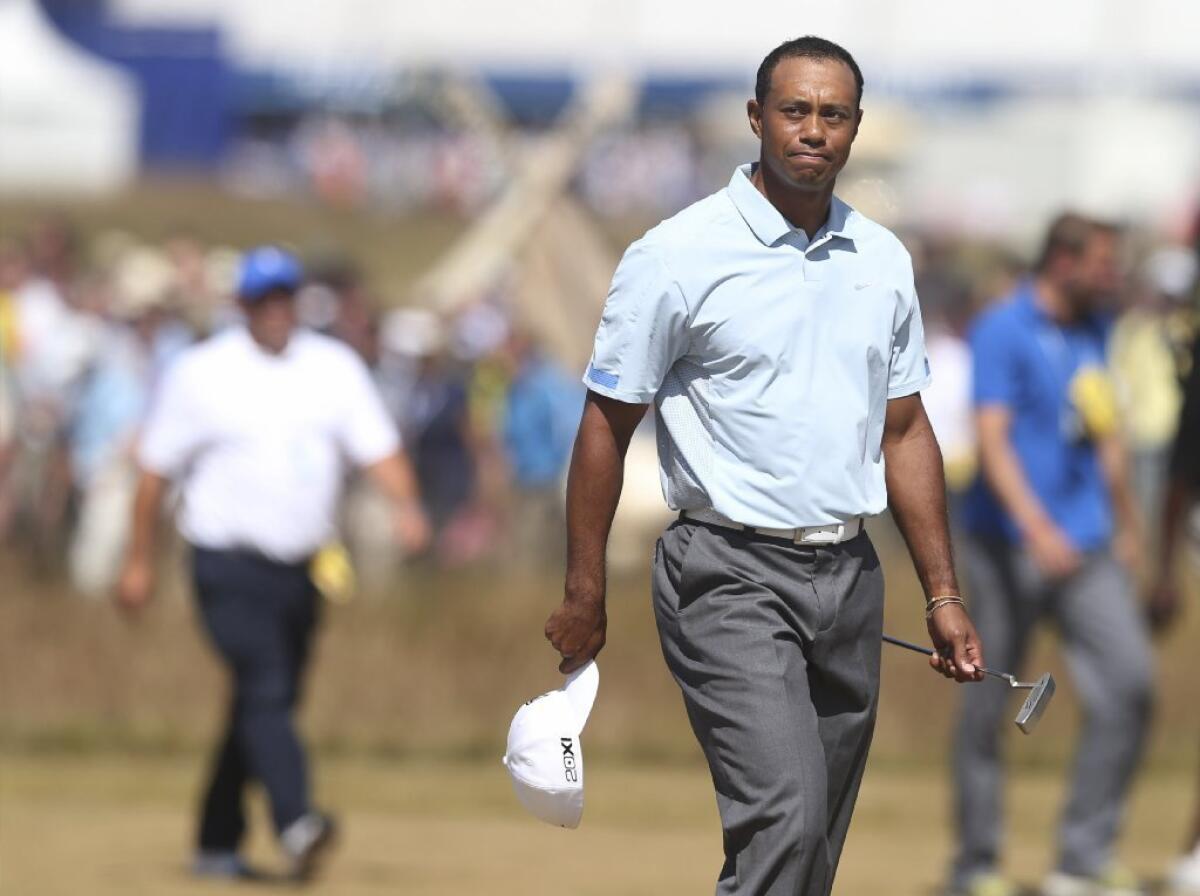 Tiger Woods walks onto the 18th green during the second round of the British Open.