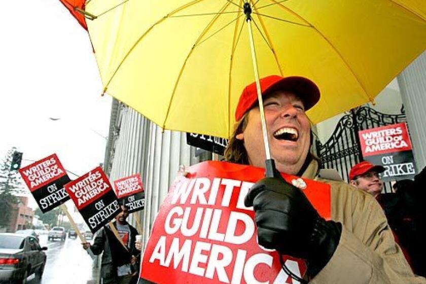 The rain dampened picket lines, if not spirits, as John Matta and compatriots from the Writers Guild of America walked outside Sony Pictures in Culver City on Friday morning.
