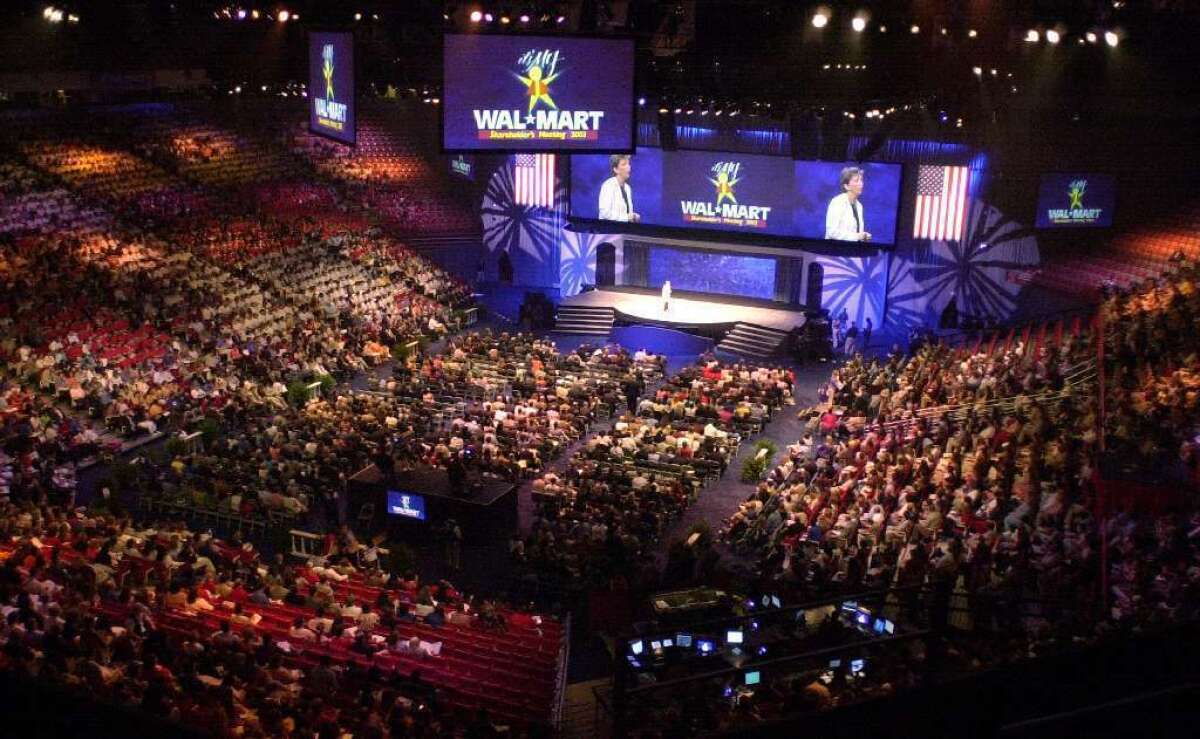 Shareholders fill Bud Walton Arena on the University of Arkansas campus for the annual Wal-Mart shareholders' meeting in Fayetteville, Ark.