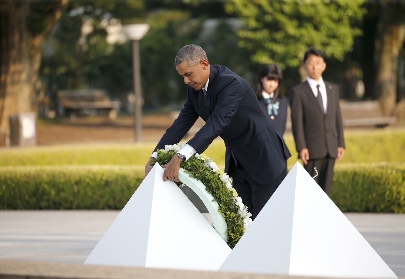President Barack Obama lays a wreath at Hiroshima Peace Memorial Park.