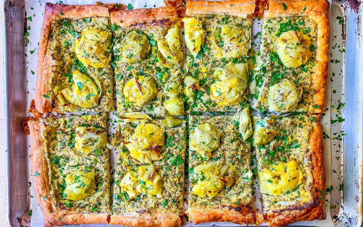 Inspired by the classic Roman dish, artichokes are mixed with fresh herbs then baked on puff pastry until golden brown.