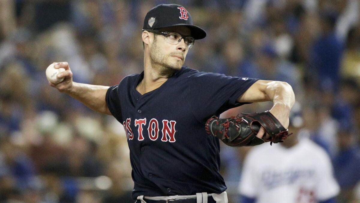 Relief pitcher Joe Kelly throws against the Dodgers during the sixth inning in Game 3 of the World Series.