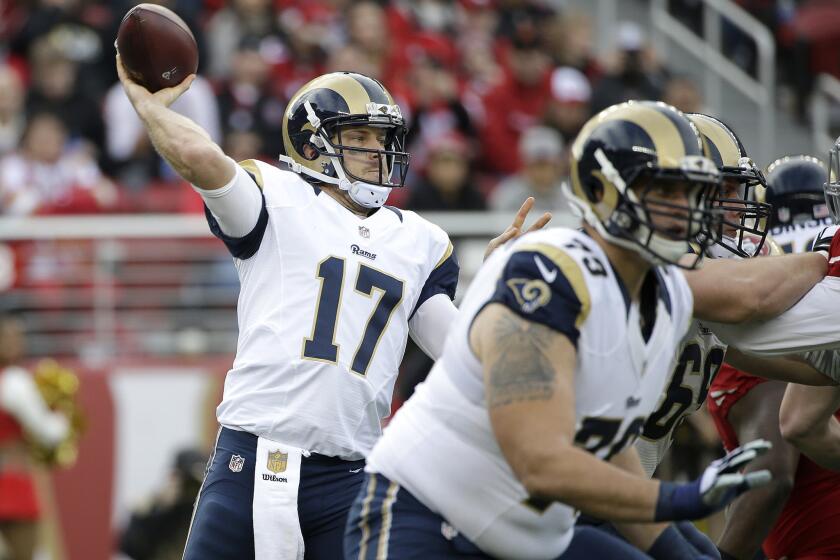 Rams quarterback Case Keenum (17) passes against the 49ers during a game on Jan. 3 at Levi's Stadium.