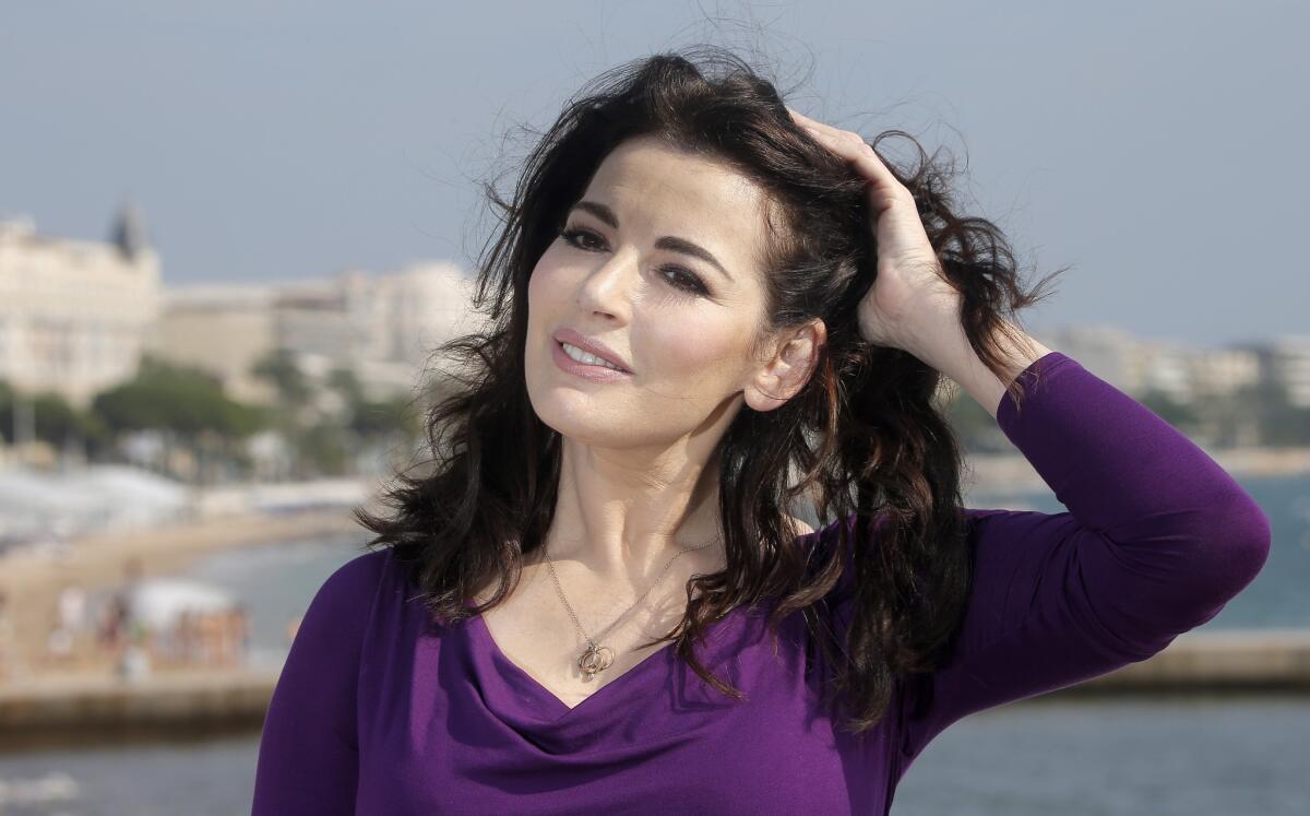 There will be an investigation into recent photos of Nigella Lawson with her husband's hands around her neck.
