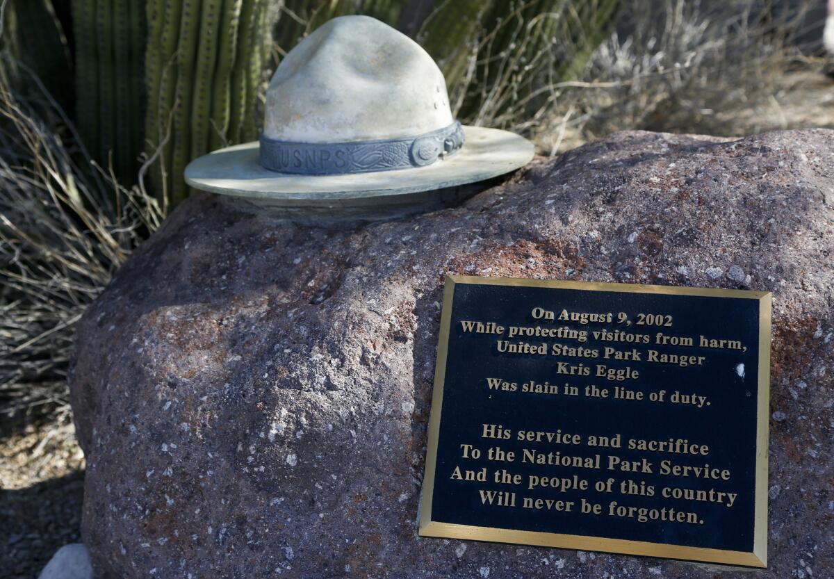 A stone hat and plaque memorialize Park Ranger Kris Eggle, who was killed while chasing drug smugglers in 2002.