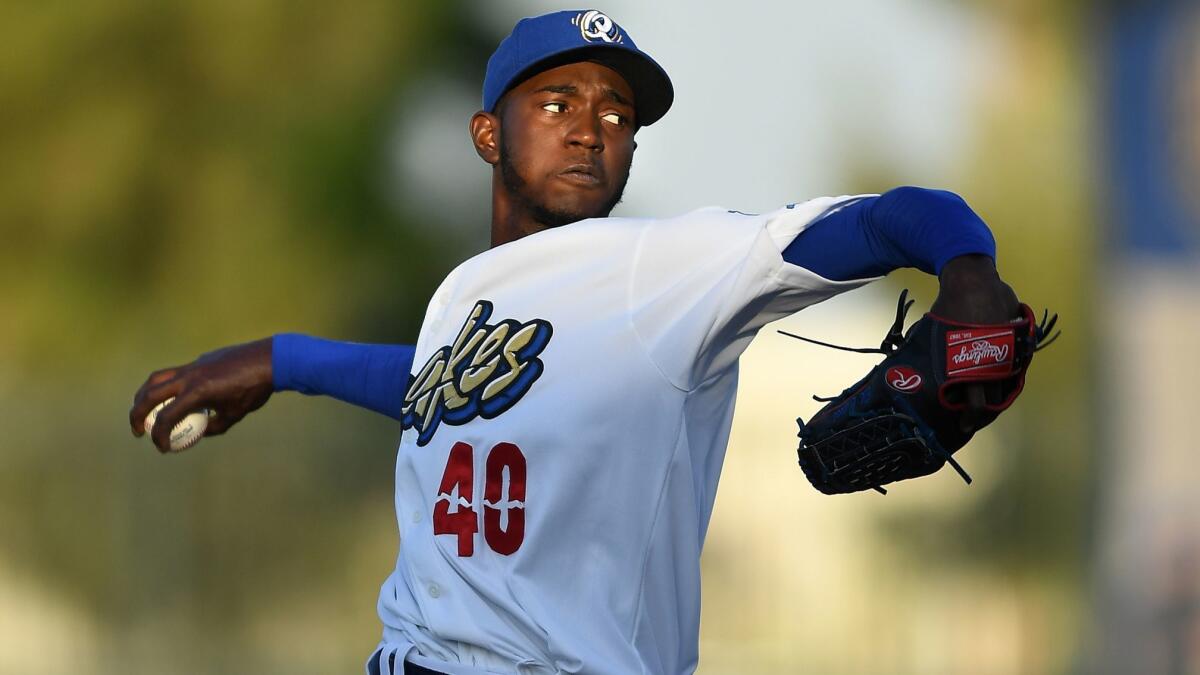 Dodgers pitching prospect Yadier Alvarez throws a pitch for Rancho Cucamonga during a game on June 5, 2017