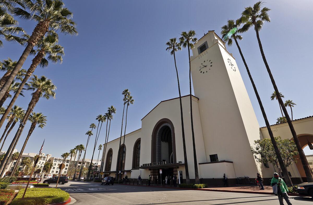 Travelers pass through Union Station, which opened in May 1939.