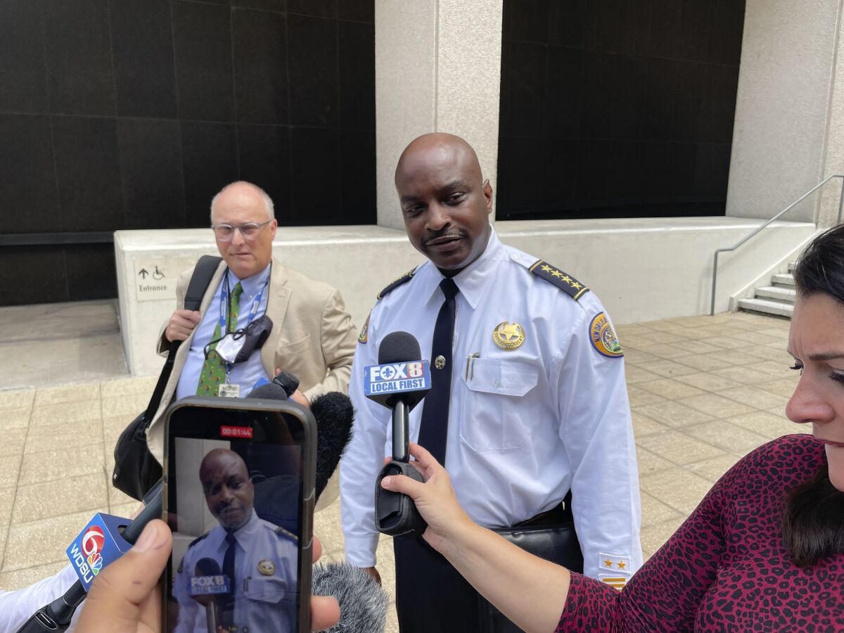 New Orleans Police Superintendent Shaun Ferguson talks to reporters outside the federal courthouse in New Orleans on Wednesday, Aug. 17, 2022, following a hearing on the city's police reform efforts. (AP Photo/Kevin McGill)