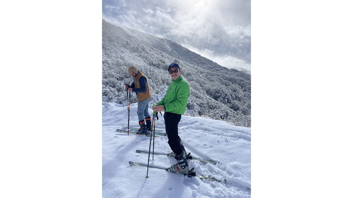 Spencer Buchanan and Charlie Beek skiing at Santiago Peak on Dec. 12.