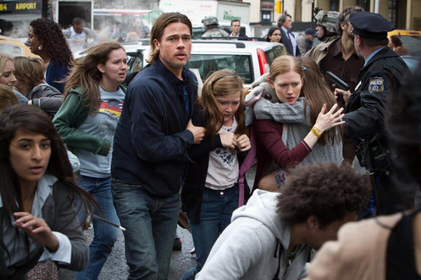 Brad Pitt as Gerry Lane and his family in "World War Z."