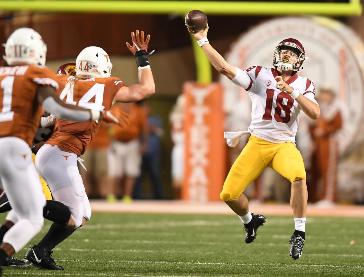 USC quarterback JT Daniels throws a pass against Texas in the first quarter at Royal-Texas Memorial Stadium on Saturday.