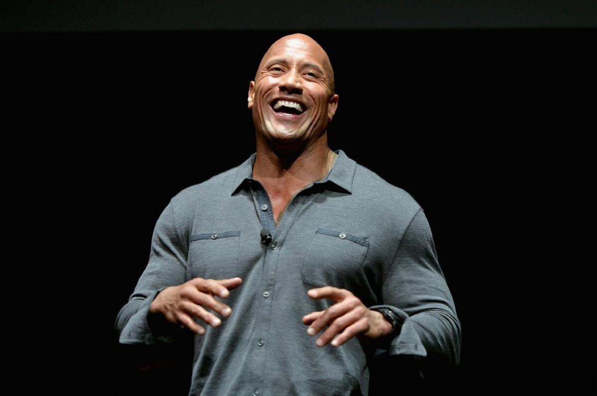 Dwayne Johnson helps kick off the first night of CinemaCon in Las Vegas while promoting his new movie "Hercules."