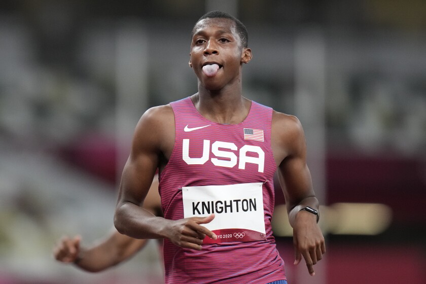 Erriyon Knighton sticks out his tongue after running the 200-meter semifinal at the Tokyo Olympics.
