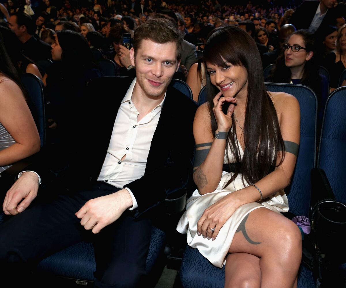"The Originals" star Joseph Morgan is engaged to "The Vampire Diaries" actress Persia White. The couple is seen here at the 40th People's Choice Awards at L.A. Live on Jan. 8.