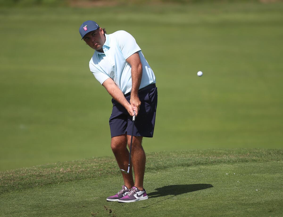 Walter Frome IV from Big Canyon Country Club chips onto the green on the ninth hole during the Jones Cup on Wednesday.