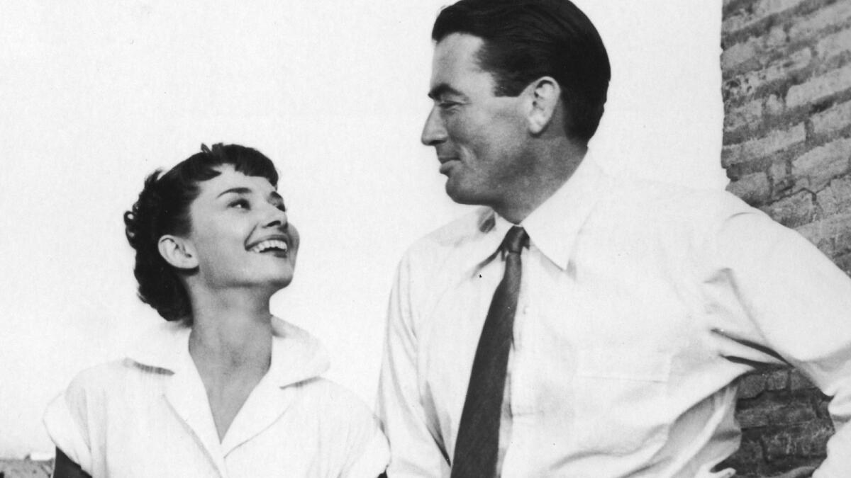 Audrey Hepburn and Gregory Peck in a still from "Roman Holiday," directed by William Wyler in 1953.