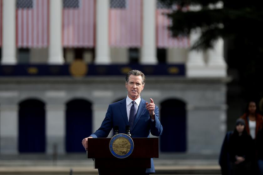 SACRAMENTO, CA - JANUARY 06: Gov. Gavin Newsom gives the inaugural address after taking the oath of office being sworn in by Chief Justice Patricia Guerrero, at his inauguration ceremony at the Capitol Mall on Friday, Jan. 6, 2023 in Sacramento, CA. Gov. Gavin Newsom celebrated the start of his second term Friday on the second anniversary of the attack on the U.S. Capitol. The Inauguration of Governor Gavin Newsom, Fortieth Governor of the State of California. Swearing-in Ceremony and Inaugural Address inauguration. (Gary Coronado / Los Angeles Times)