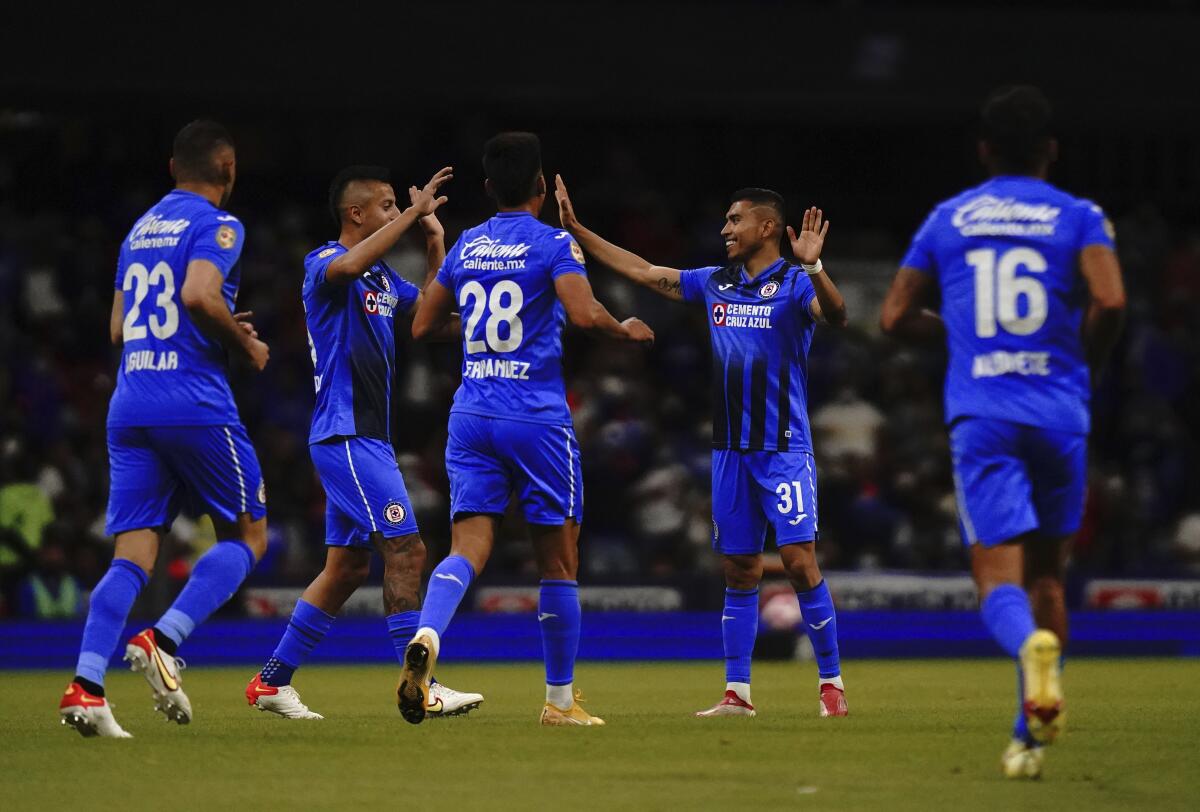 Cruz Azul's players celebrate after Tigres'  